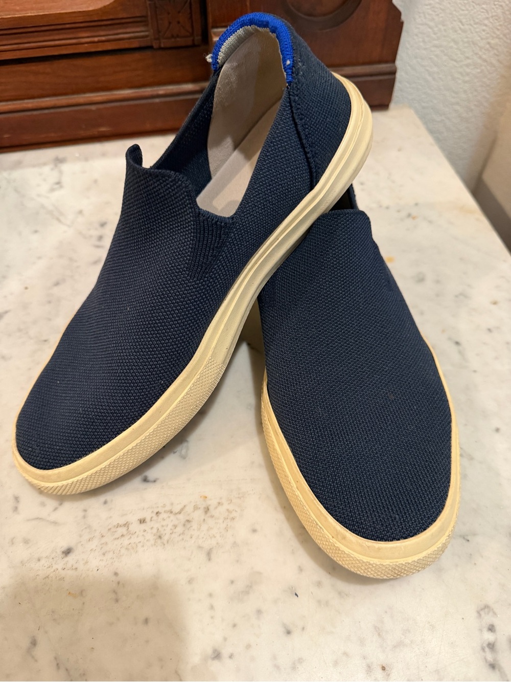 Rothy's Navy Blue Slip-On Knit Sneakers with Cream Sole